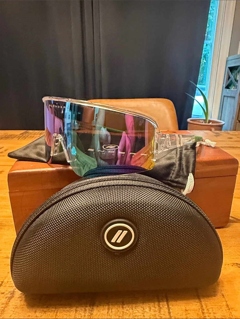 Blenders Polarized Sunglasses Purple iradescent lens with Green stems.